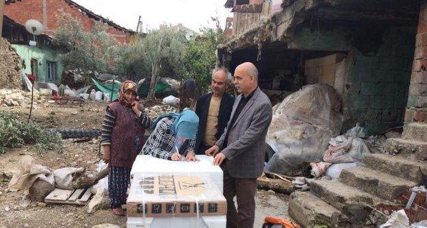 Evleri yanan ailenin imdadına büyükşehir yetişti